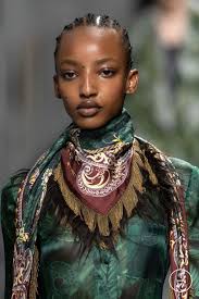 Fashion model Divine Mugisha and their looks