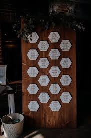 modern wedding seating chart idea wooden board with marble