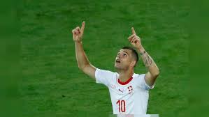 Switzerland's granit xhaka and xherdan shaqiri have been fined chf 10,000 (£7,632) after their controversial goal celebrations against serbia were deemed to have breached fifa regulations. Swiss Ministers Support Xhaka Shaqiri Over Goal Celebrations Euronews