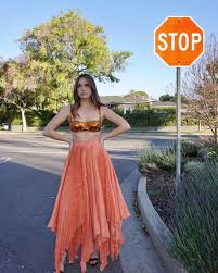 Bailee Madison Wore Altuzarra Promoting A Week Away