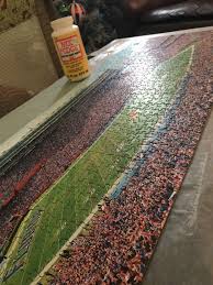 The two most important supplies you need to glue a puzzle together are are matte mod podge and a foam paint brush. How To Frame A Puzzle Puzzle Picture Frame Jigsaw Puzzle Crafts Puzzle Frame