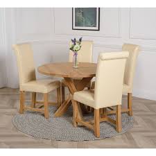 When you're styling your dining space, you're blessed with a wealth of different dining tables and dining chairs. Oregon Round Oak Dining Table With 4 Washington Ivory Leather Chairs Oak Furniture King