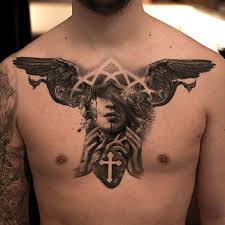 15 Religiously Symbolic Tattoos By Niki Norberg Chest Tattoo Men Chest Tattoo Chest Piece Tattoos