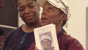 Crowd gathers to remember those killed