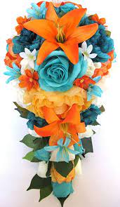With exquisite artificial flower arrangements in shades of white, pink and red, floral bouquets and twigs lend a fresh touch to your room. Amazon Com Wedding Bouquet 17 Piece Package Bridal Bouquets Silk Flower Set Orange Tangerine Aqua Blue Teal Silk Flower Centerpiece Rosesanddreams Home Kitchen