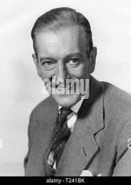 Let's Be Happy (1957) Guy Middleton, Date: 1957 Stock Photo