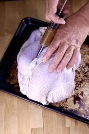 How to make a turkey injection marinade for thanksgiving. Smoked Apple Cider Turkey Juicy Delicious Out Grilling