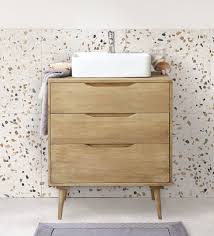You can put usual toiletries and basic skin care products in the glass door, making it clear at a glance. Solid Mango Wood Single Sink 2 Drawer Bathroom Vanity Trocadero Maisons Du Monde
