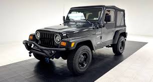 Image result for Brilliant Black 2002 Jeep