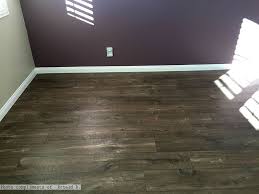 Mocha Oak Laminate Flooring In The Bedroom Paired With Purple Walls Love This Rustic Flooring Photo Compliments Ron Flooring Vinyl Flooring Rustic Flooring