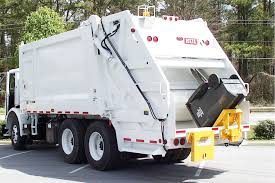 It also has a low and narrow profile that fits through most doors and gates. Tl 2232 Series Cart Lifter Garbage Truck Lifters Cart Tippers