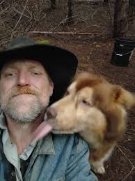 Black female long hair dog found in Tigard