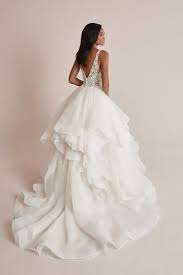 This gown is topped with beaded lace appliques crafted from three different types of lace and over 500 pearls, sequins, and beads. V Neck Wedding Dresses Justin Alexander