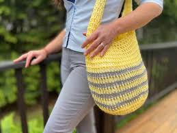 Whistle & ivy originally designed this crochet bag in honor of the annual knit and crochet in public day. Crochet Market Bag Free Pattern Beginner Friendly Maplewood Road