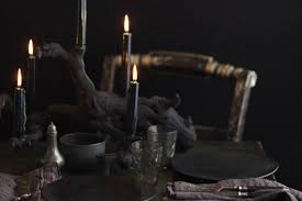 Invite guests to dress in costume or have them wear all black to match the party theme. Elegant Black White Gold Halloween Dinner Party Inspiration