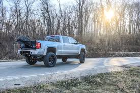 Assemble the spare tire rods, and use your truck key to unlock the cylinder that's blocking access to the spare tire. Tiregate Prerunner Wilcooffroad Com