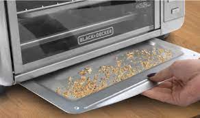 In the crumb tray and could catch fire if not emptied regularly. Extra Wide Toaster Oven Black Decker