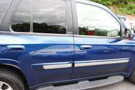 Image result for Superior Blue 2004 Envoy