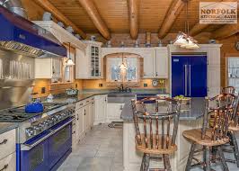 log cabin kitchen with blue appliances