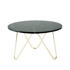 The coffee table presents a refined aesthetic. Gold Metal And Black Marble Coffee Table Eagle Maisons Du Monde