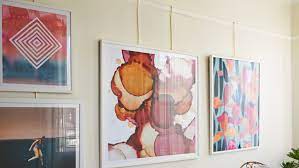 With a sleek and simple look, the gallery rail works with both hanging rods and cables. Try A Picture Rail Spare Your Art Filled Walls From Nail Holes Architectural Digest