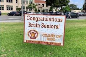 High School Seniors Celebrated With Yard Signs