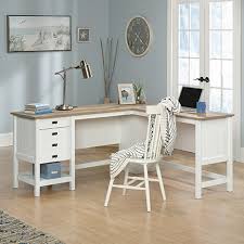 This beautiful home office desk with storage also includes two lower open shelves with slat panel detailing to give it that casual cottage style. Cottage Road L Shaped Desk Soft White 428225 Sauder Sauder Woodworking