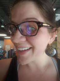 Earrings of different sizes worn without noticing