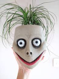 Creepy Ghost Head Planter: Spooky Wall Decor for Gothic Plant Art