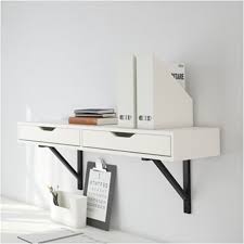Today i built two brackets from 1x4's to be used in conjunction with an ikea desktop to make an amazing (subjective) wall mounted desk. Ikea Wall Mounted Desk Svalnas Ikea Workspace And Shelving System Desk In Living Room Home Office Room Decor Shop For Desk On Etsy The Place To Express Your Creativity Through