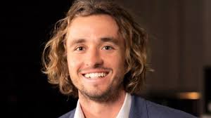 Real estate boss Jonathan Bell is charged with drink driving after four-car  pile-up injured a pregnant woman and destroyed his $400,000 Lamborghini SUV  in Brisbane