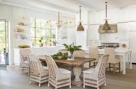 reclaimed wood dining table with wicker