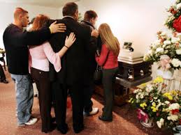 Residents pay respects to miners