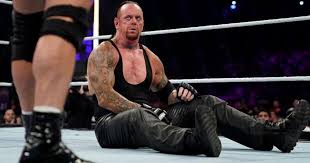A regular part of his costume was the widest tie ever worn. Undertaker S Final Farewell Shuts The Door On Wwe Career For Now