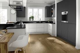 Neutral colored countertops and wooden open shelving keep this kitchen feeling natural. 1001 Kitchen Design Ideas For Your 2019 Home Renovation