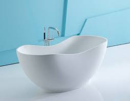 Freestanding bathtub with center drain in white Solid Surface Bathtub Lithocast Freestanding Baths By Kohler