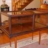 This is an antique museum display cabinet. 1