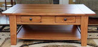 Featuring a convenient lift top, this coffee table offers the added versatility of being utilized as additional workspace or for dining. Wardlow Auctions