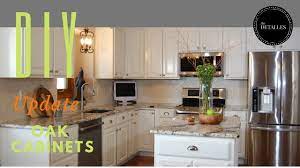 How To Paint Oak Cabinets And Hide Wood Grain Painting Oak Cabinets Oak Cabinets Cabinet