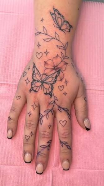 Simple Butterfly Finger Tattoo