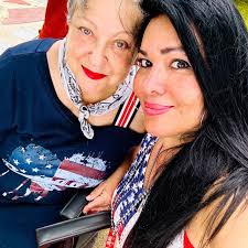 Wayne State President M. Roy Wilson presents student Evan Leedy with the  Presidential Service Award. The award is given in recognition of exemplary  contributions by a student to the community. The 19-year-old