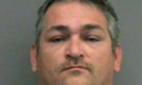 Three Klan-linked prison workers arrested over plot to kill black inmate