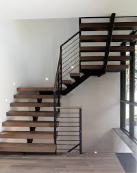 Spindle Floating Stair In 2020 Home Stairs Design Stairs Design Modern Stairway Design