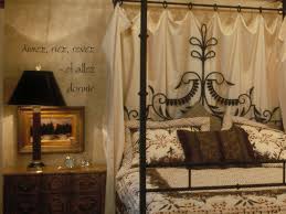 Wrought iron bed frames are usually painted black or a patina that gives it an aged look. Wrought Iron Bed Idea French Lettering Idea