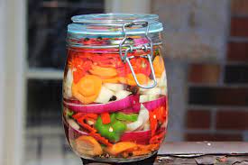 Jamaican Pickled Peppers The Full Step By Step Recipe Can Be Found Caribbeanpot Com Stuffed Peppers Caribbean Recipes Jamaican Recipes