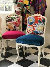 Pin in place and cut around the pattern, leaving 2 to 3 inches of fabric beyond the stapled edges of the original pieces. Colorful Chairs For An All White Kitchen Chair Whimsy