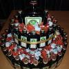 It is obviously a smirnoff bottle cake, (a huge smirnoff bottle, the actual bottle was 42cm long!!) the cake inside is red velvet (chocolate… 1