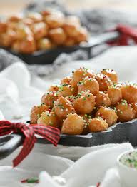 Same recipe, in fact we usually make some bows and then struffoli at the end with the same dough. Struffoli Italian Honey Balls Marisa S Italian Kitchen