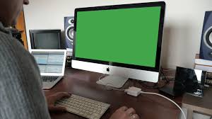 You can reach thousands of impressions withing a single day. Man Using Computer With Green Screen Display Free Stock Footage Unripe Content