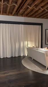 @theshadestore did an incredible job fabricating and installing these  drapes. The fabric is a yummy Holland and Sherry winter white wool lined  for extra coziness. The style is a ripple fold and it is ...